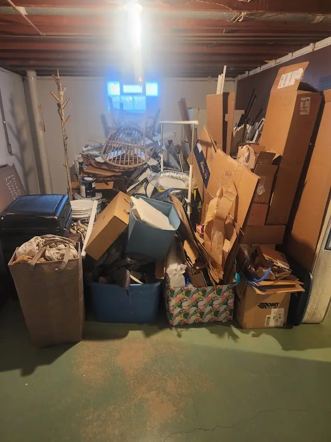 Roll-off dumpster container at job site for Yard Waste Dumpster Rental in Camdenton